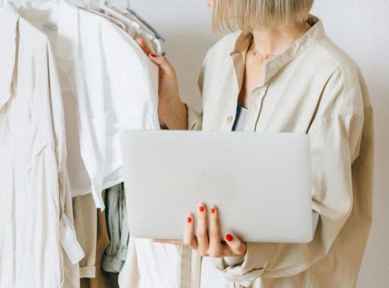 Woman Shipping clothes in a box